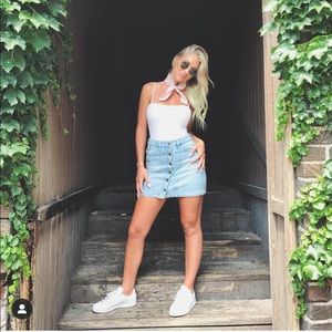 Denim skirt with embroidered floral pattern